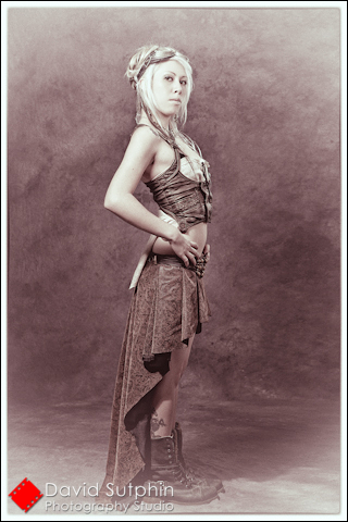 Full length profile of Krystalle in her Steampunk costume.